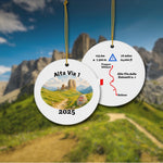 Alta Via 1 personalized trail keepsake ornament hanging with Dolomites background, showing both sides: watercolor landscape front and detailed trail map back.